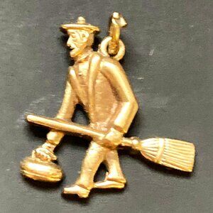 Delightful signed vintage curler charm or pendant in 10K gold